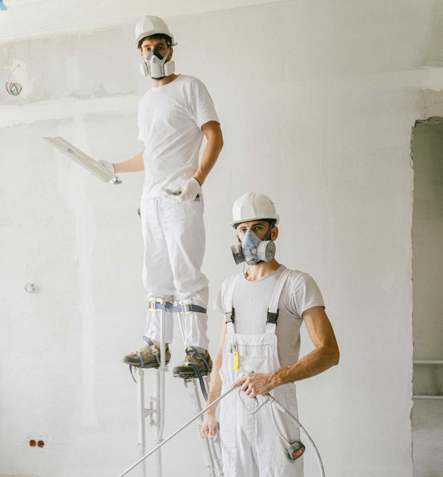 Technicians working on various building services